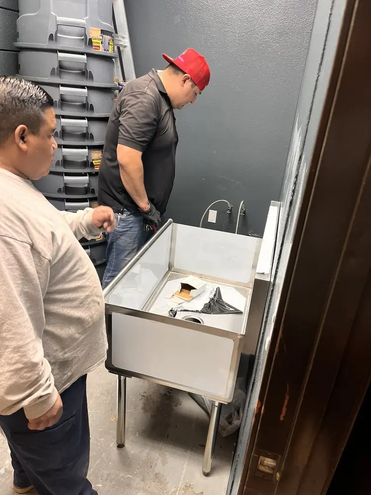 Commercial plumbing and sink installation in Elmwood